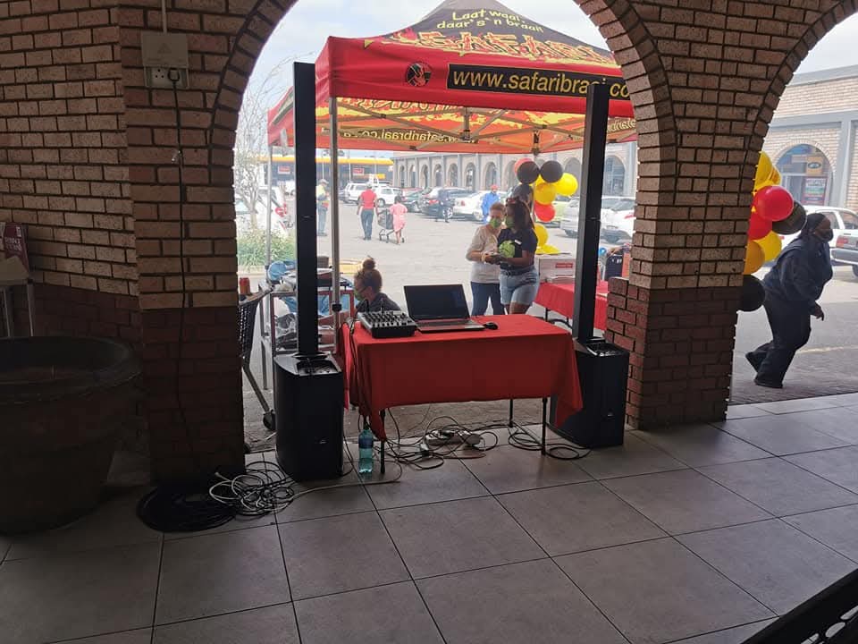 Sound setup under a canopy at a public shopping centre event