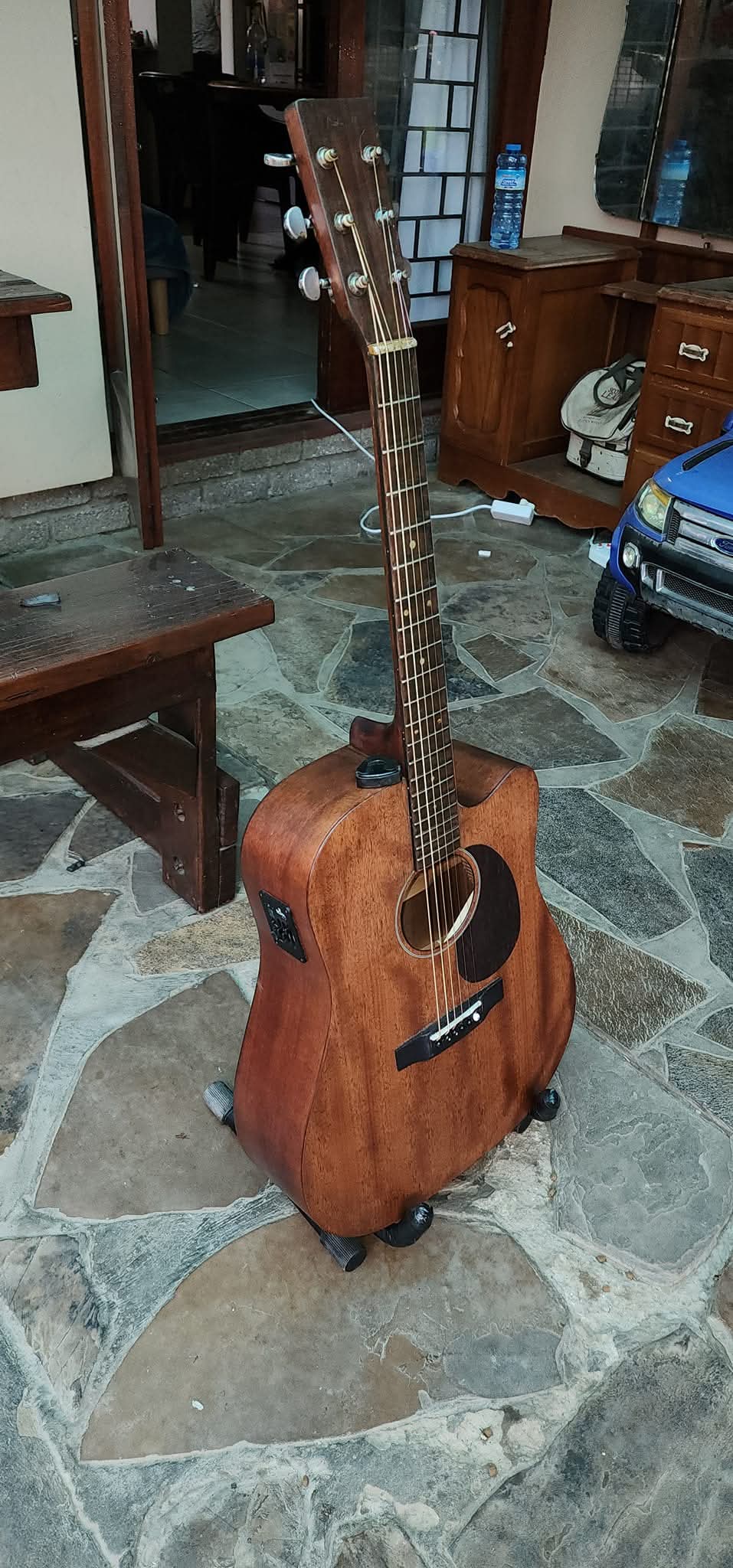 Acoustic guitar shown after service or rebuild work