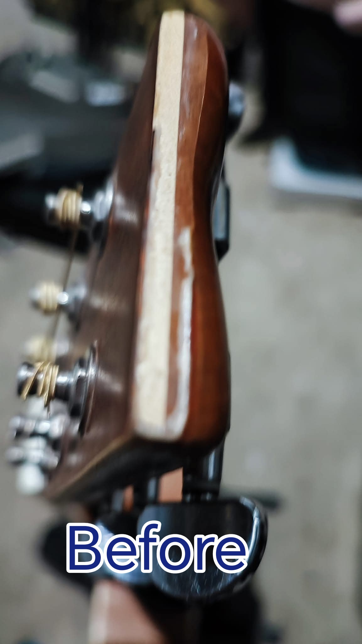 Before image of guitar headstock repair work
