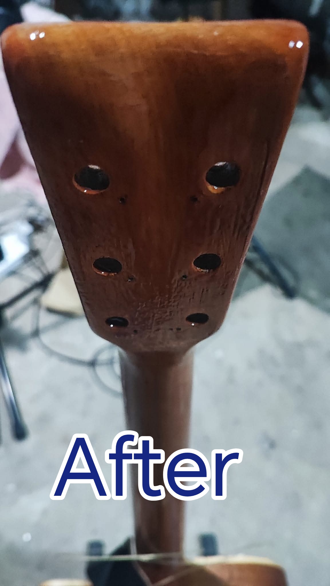 After image of guitar headstock repair work