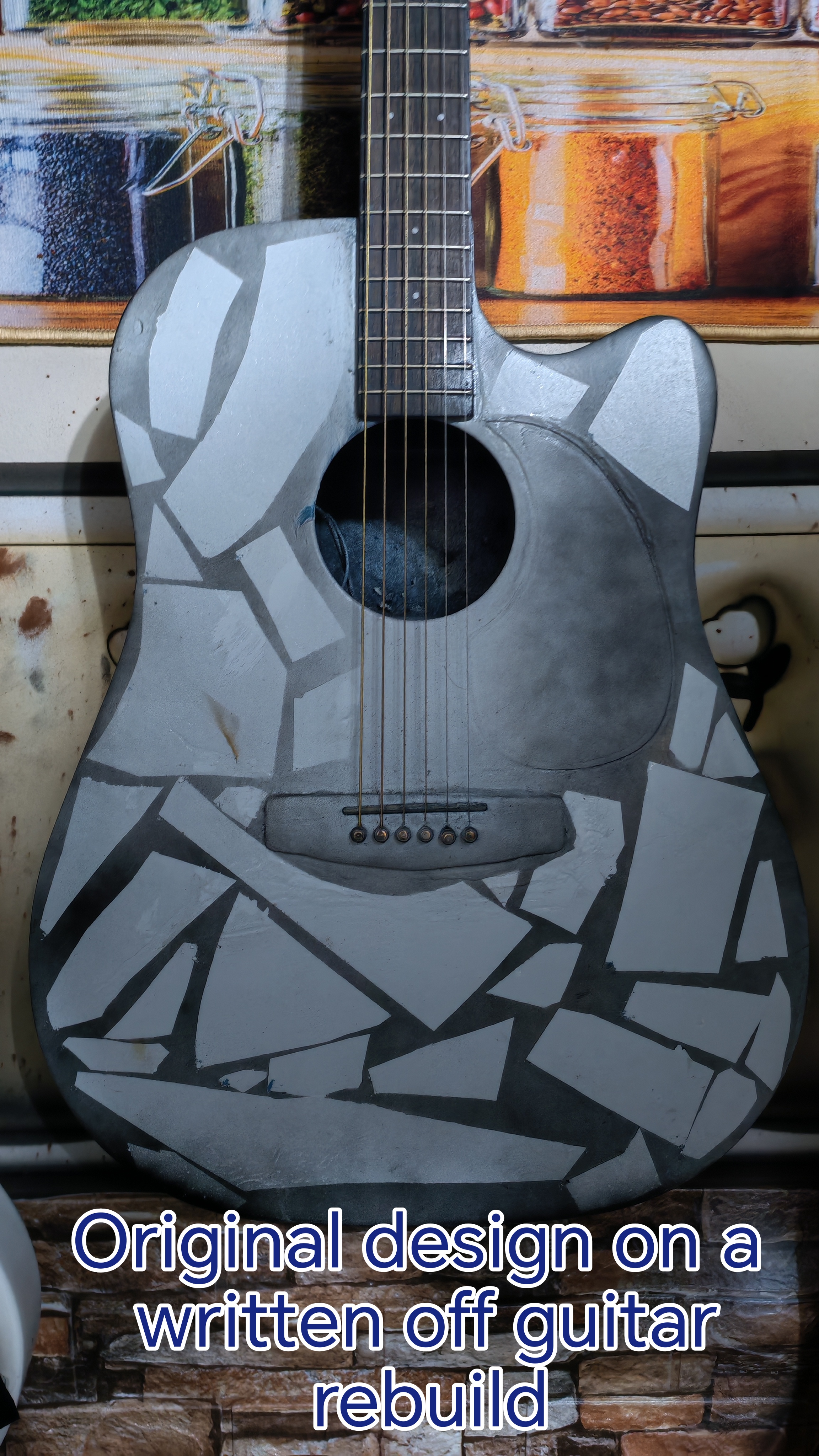 Custom rebuild design on a repaired guitar body