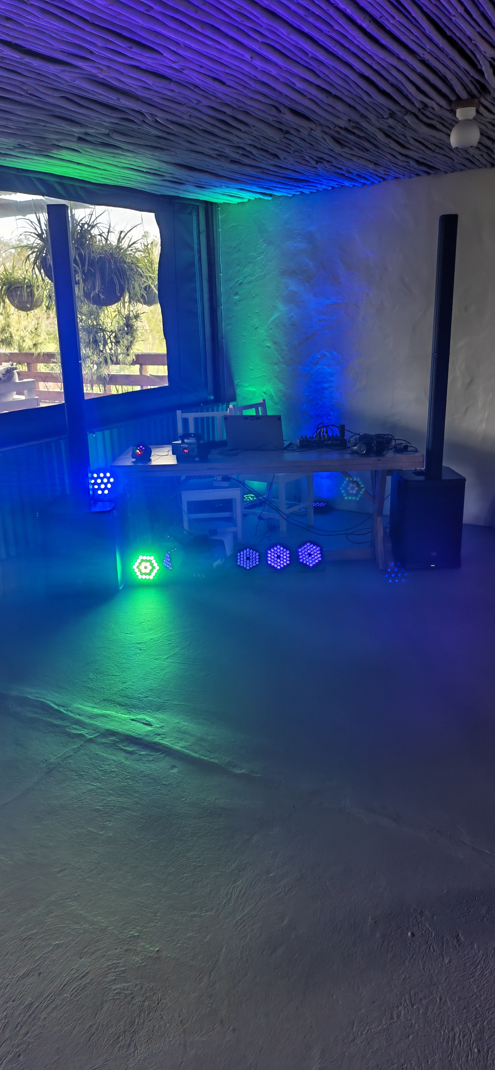 Colourful lighting and sound equipment set up in a room